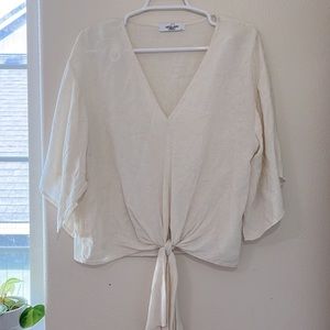 Carly Jean Los Angeles off white shirt.